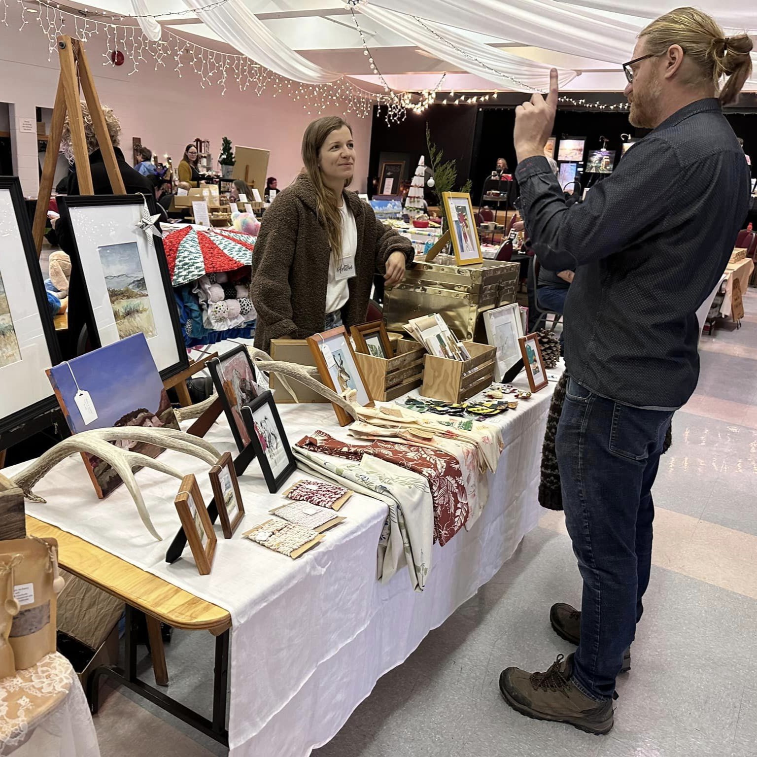 Photo on on SK Arts - Arts funding agency website showing and Artisan market inside a chapel in progress