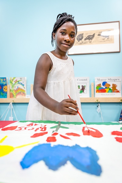 A girl and her painting.