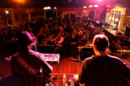Shuyler Jansen performs at Ananda Art House's Happy Nun Cafe