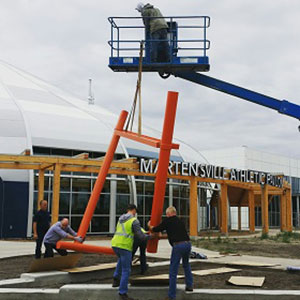 Installation of Douglas Bentham's sculpture, Autumn Song