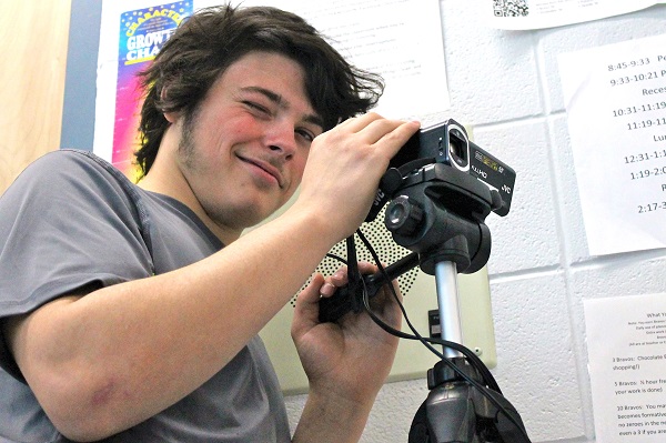 A student at Maymont Central School helps film a LIVE Arts broadcast in 2014