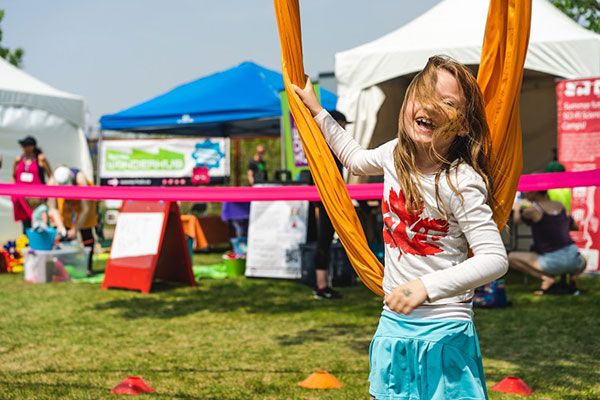 A young participant revels in Kids Fest 2019